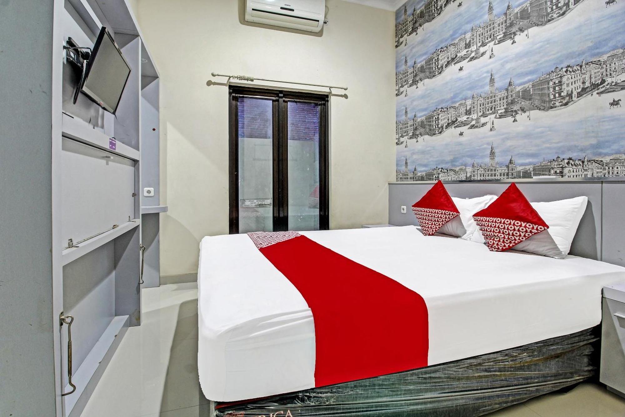 Super Oyo 91202 Family Guest House Syariah Тулунгагун Екстериор снимка