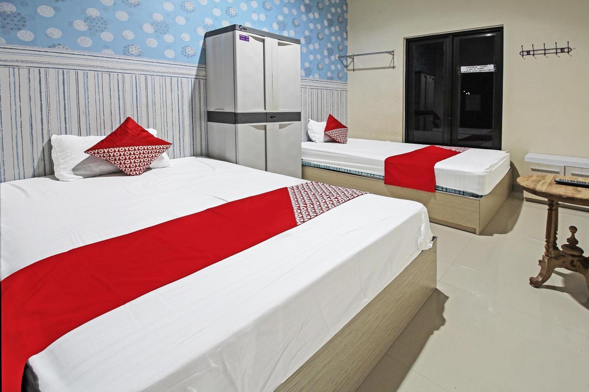 Super Oyo 91202 Family Guest House Syariah Тулунгагун Екстериор снимка