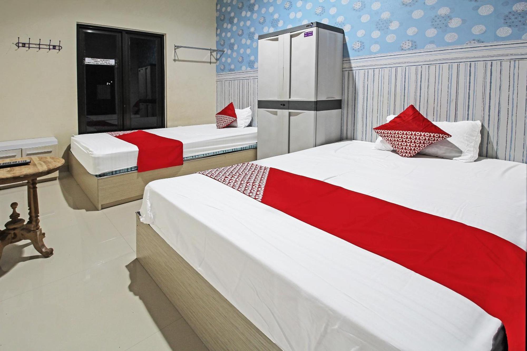 Super Oyo 91202 Family Guest House Syariah Тулунгагун Екстериор снимка